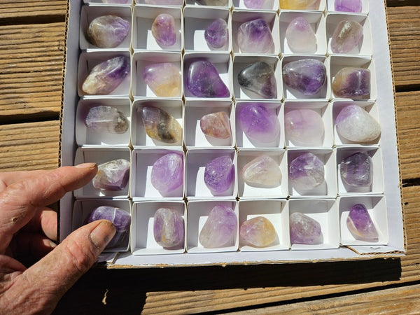 Box of 54 tumble polished Wyloo Amethyst AMT101