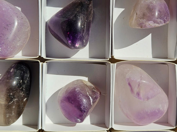 Box of 54 tumble polished Wyloo Amethyst AMT101