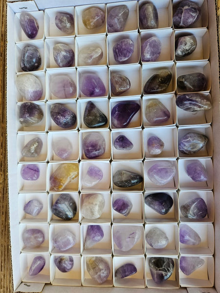Box of 54 tumble polished Wyloo Amethyst AMT101