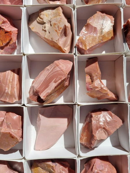 Box of Pink Opal rough.  POR153