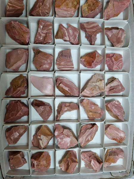 Box of Pink Opal rough.  POR153