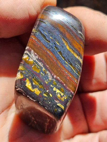 Tumble polished Tiger Iron TIT110