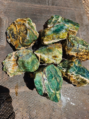 8 pieces of Green Opal  rough.  GOR 142