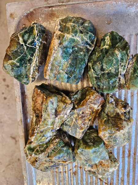 8 pieces of Green Opal  rough.  GOR 142