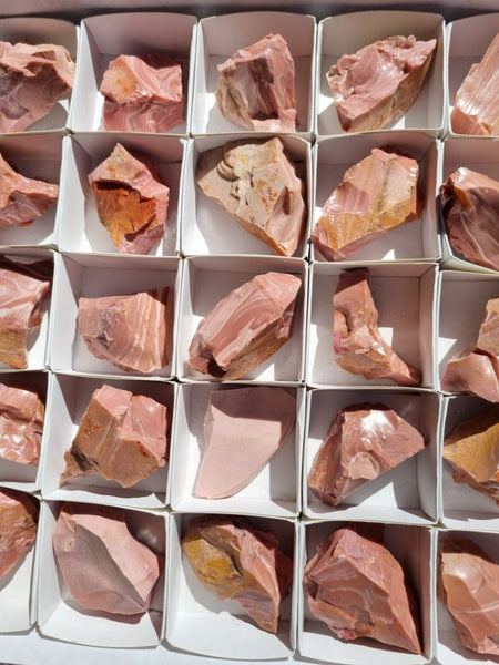Box of Pink Opal rough.  POR153